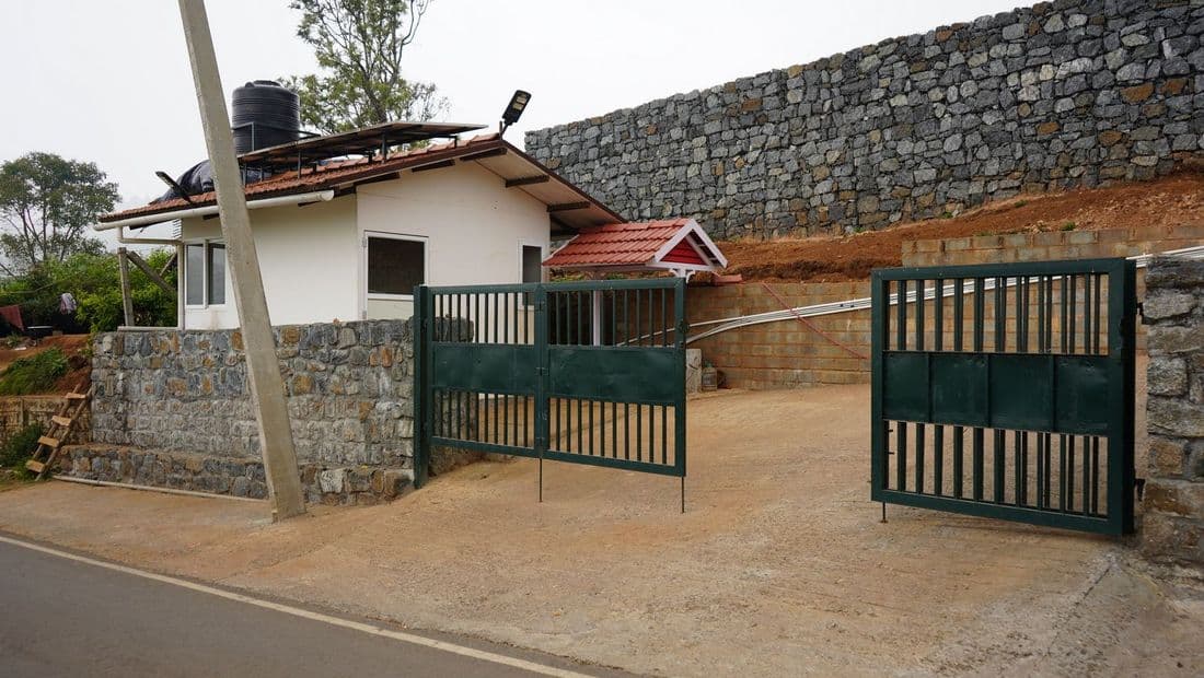 Main Gate with security gate and well